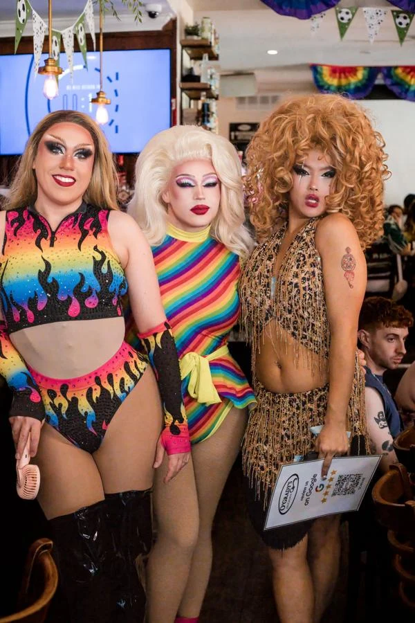 Three performers posing at O’Grady’s